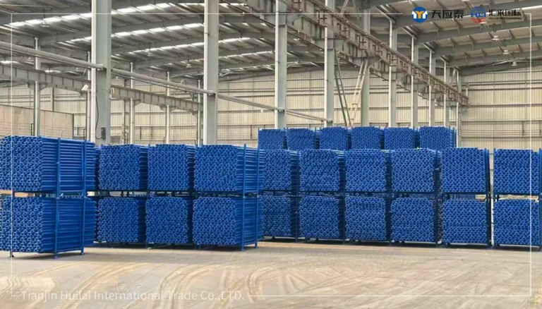 Blue cuplock scaffolding parts stacked in factory for Middle East industrial project
